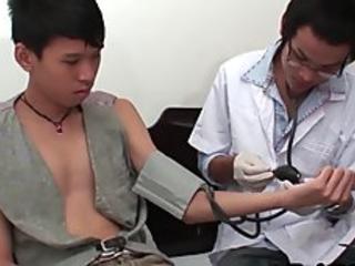 Skinny Asian patient toyed and breeded by his medic in duo