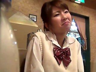 Asian rubs her carpet