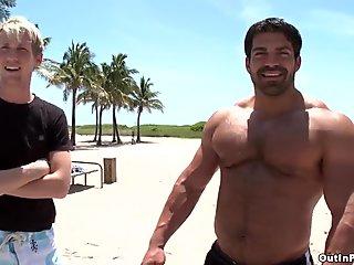 Muscular poofter makes a twink suck and ride his dick in the street